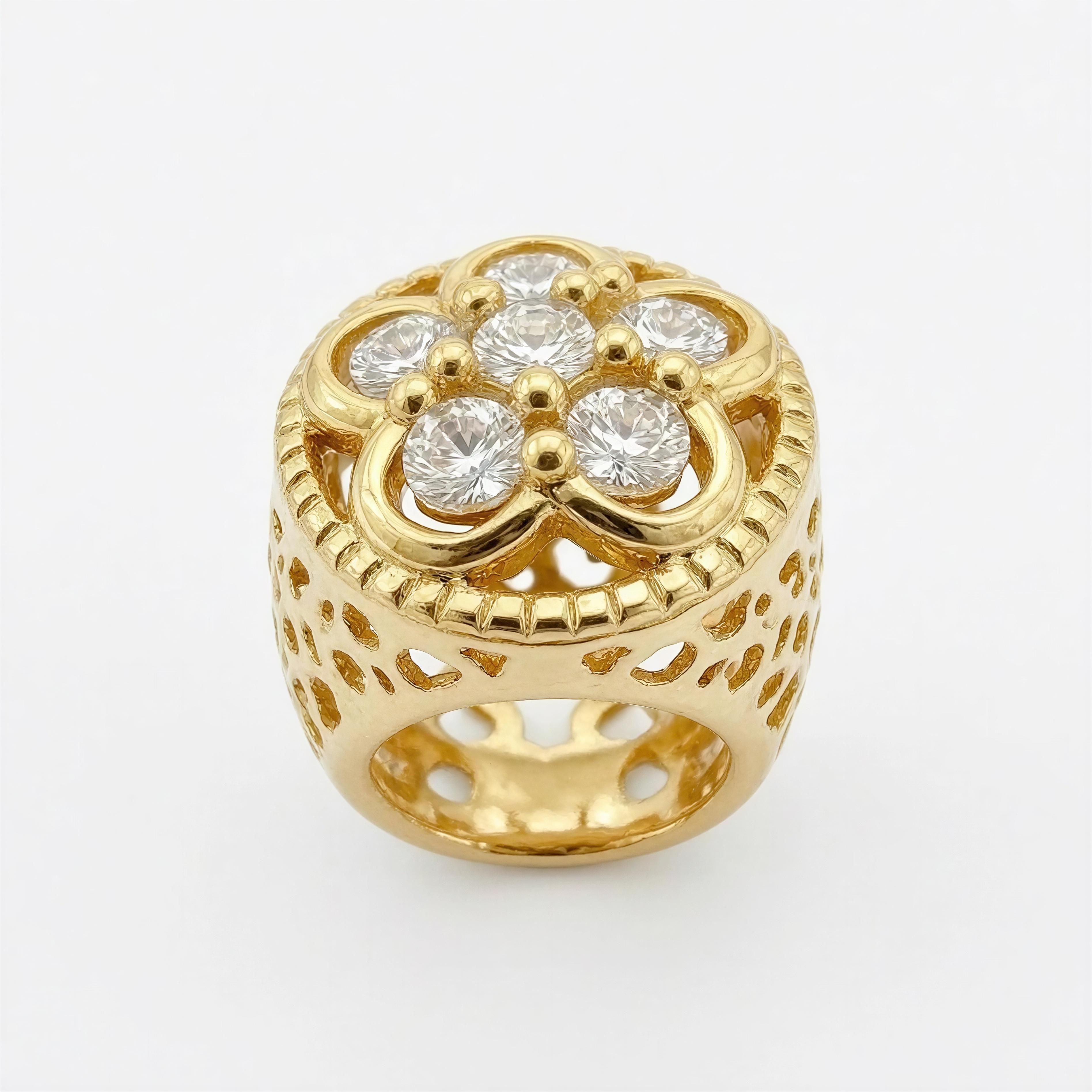 Close-up of an ornate gold charm with intricate openwork and sparkling clear stones, designed as part of The Riviera Sunglass Chain – Rosé Lumière collection.