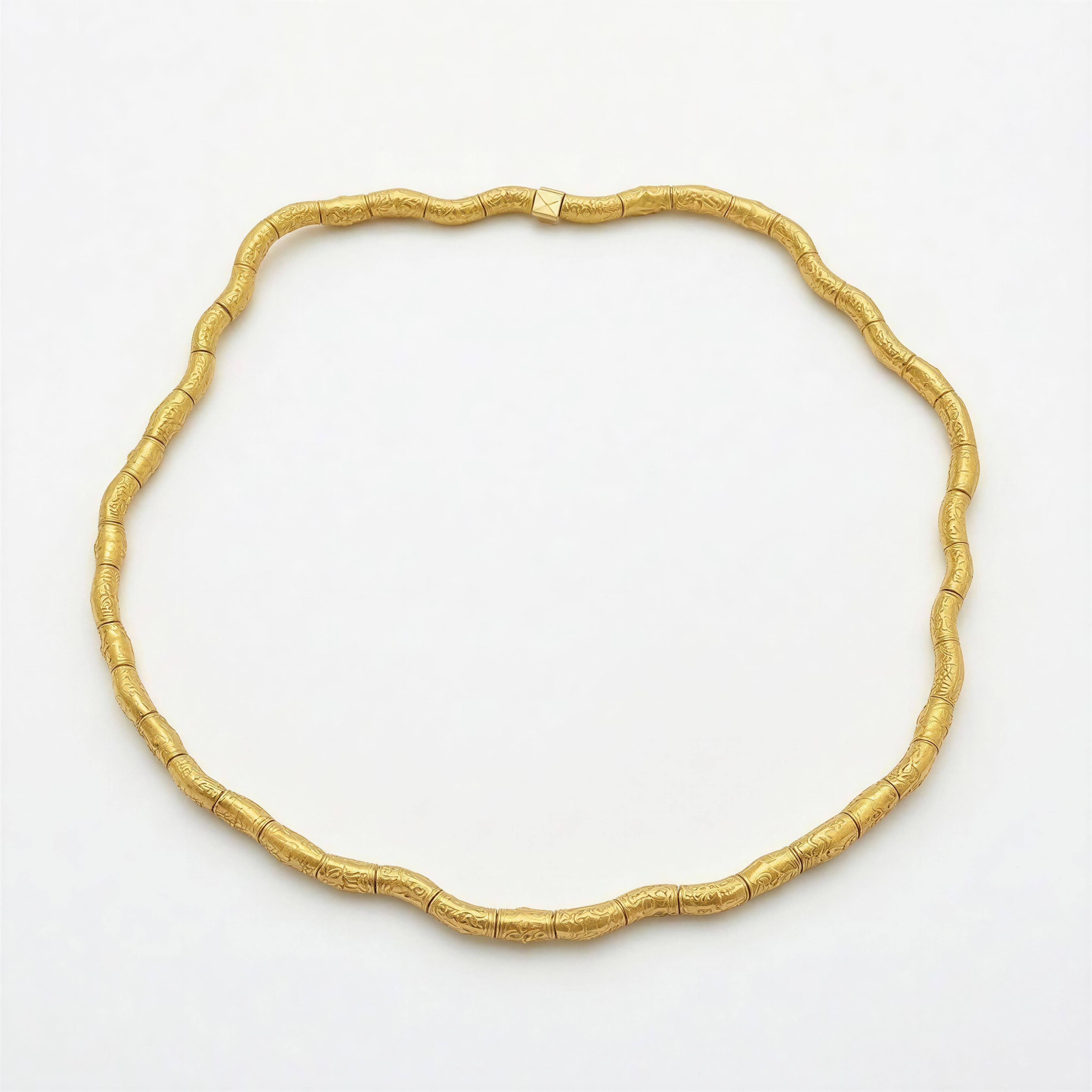 Elegant gold-tone necklace with textured, curved tubular beads forming a continuous loop, showcasing refined craftsmanship in Necklaces - AURELIS.