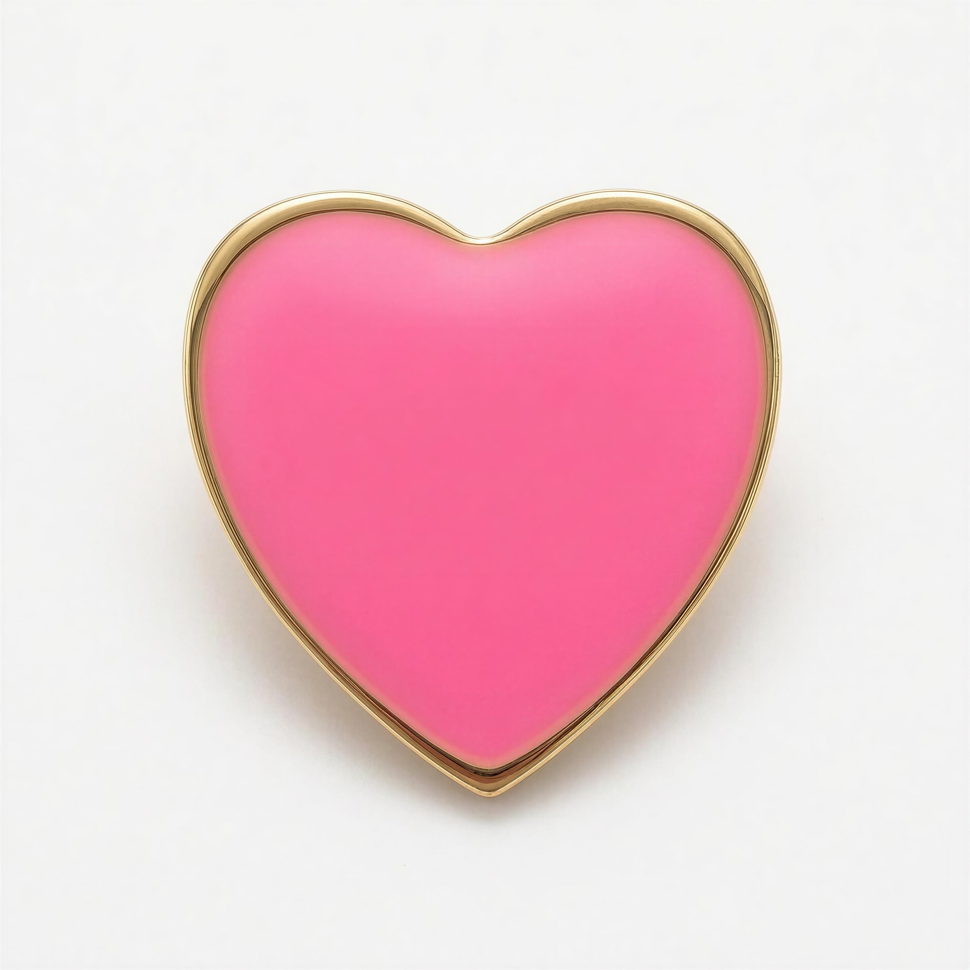 The Little Icons Collection - Pink Little Heart features a smooth, vibrant pink heart-shaped charm outlined with a delicate gold trim, embodying handcrafted luxury jewelry.