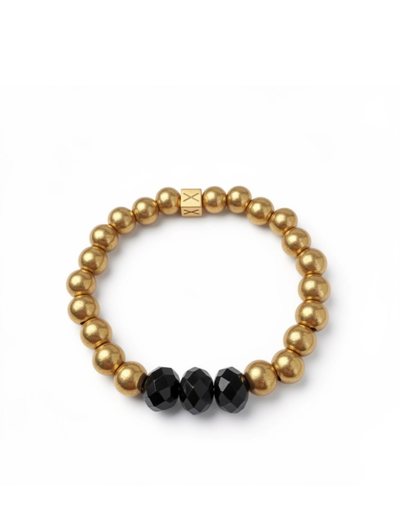 Limited Edition - Aurea Trinitas Antiqua bracelet featuring polished gold beads and three faceted black beads, combining elegant luxury with handcrafted artistry.