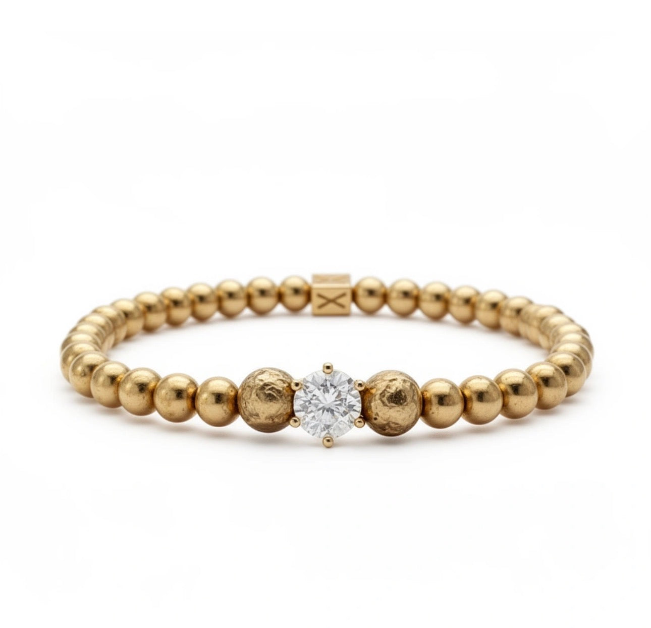 Timeless Collection - Lux Textura gold beaded bracelet featuring a central sparkling gemstone, combining handcrafted luxury and elegant designer style.