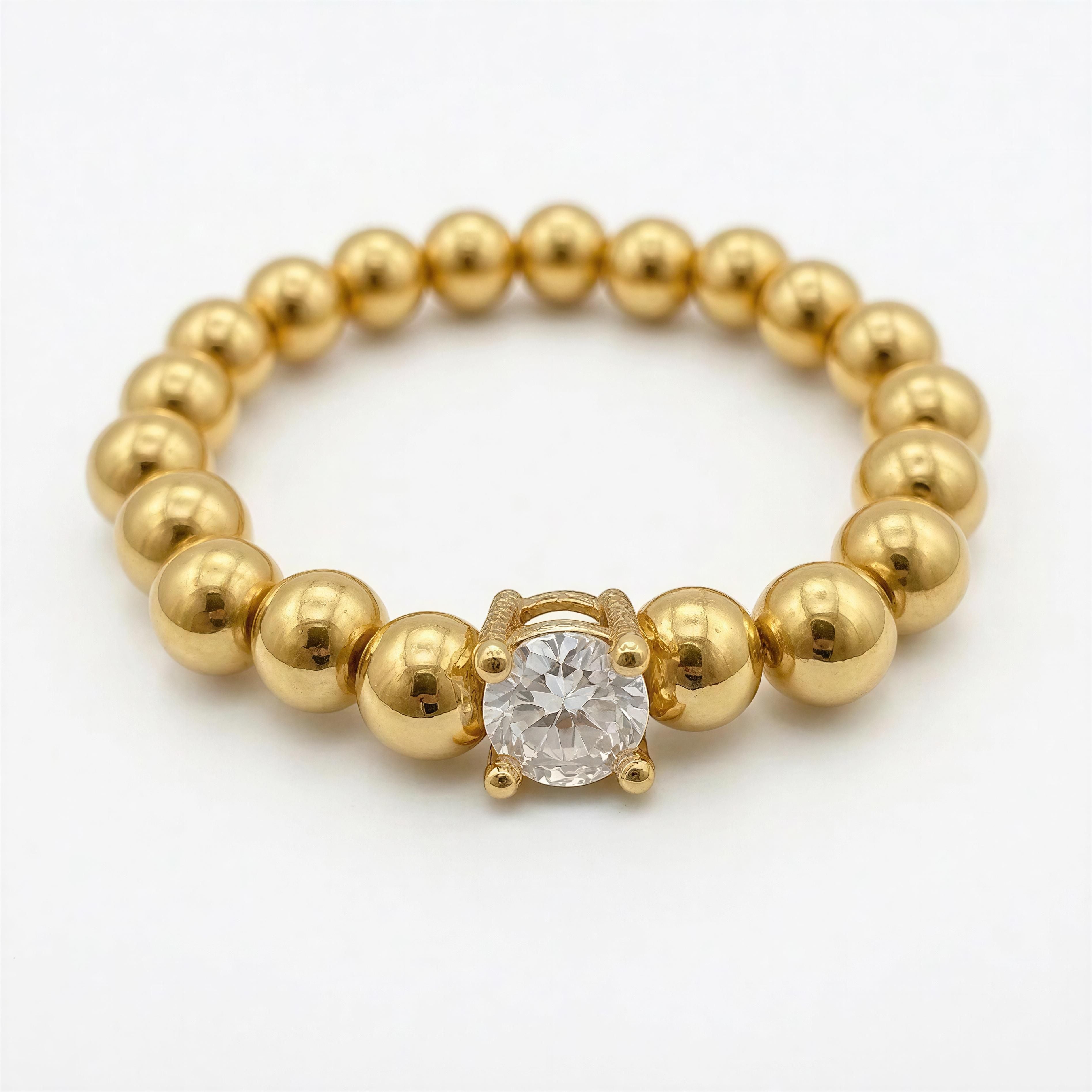 RING - LUCENT ÉTOILE RING featuring a polished gold bead band with a sparkling round clear gemstone centerpiece, showcasing handcrafted luxury jewelry design.