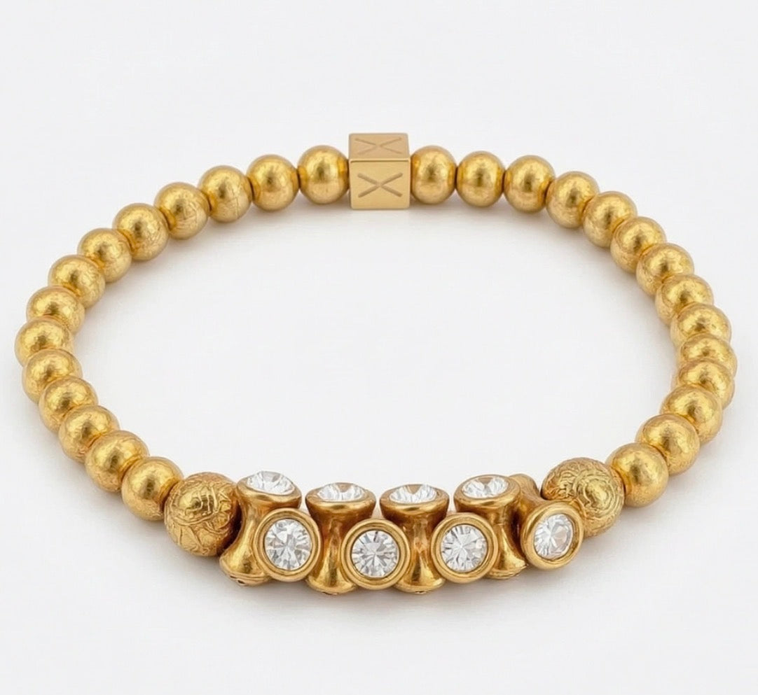 Limited Edition - Aurea Luminis bracelet featuring textured gold beads and sparkling clear crystals in a balanced, elegant design by Atelier X.