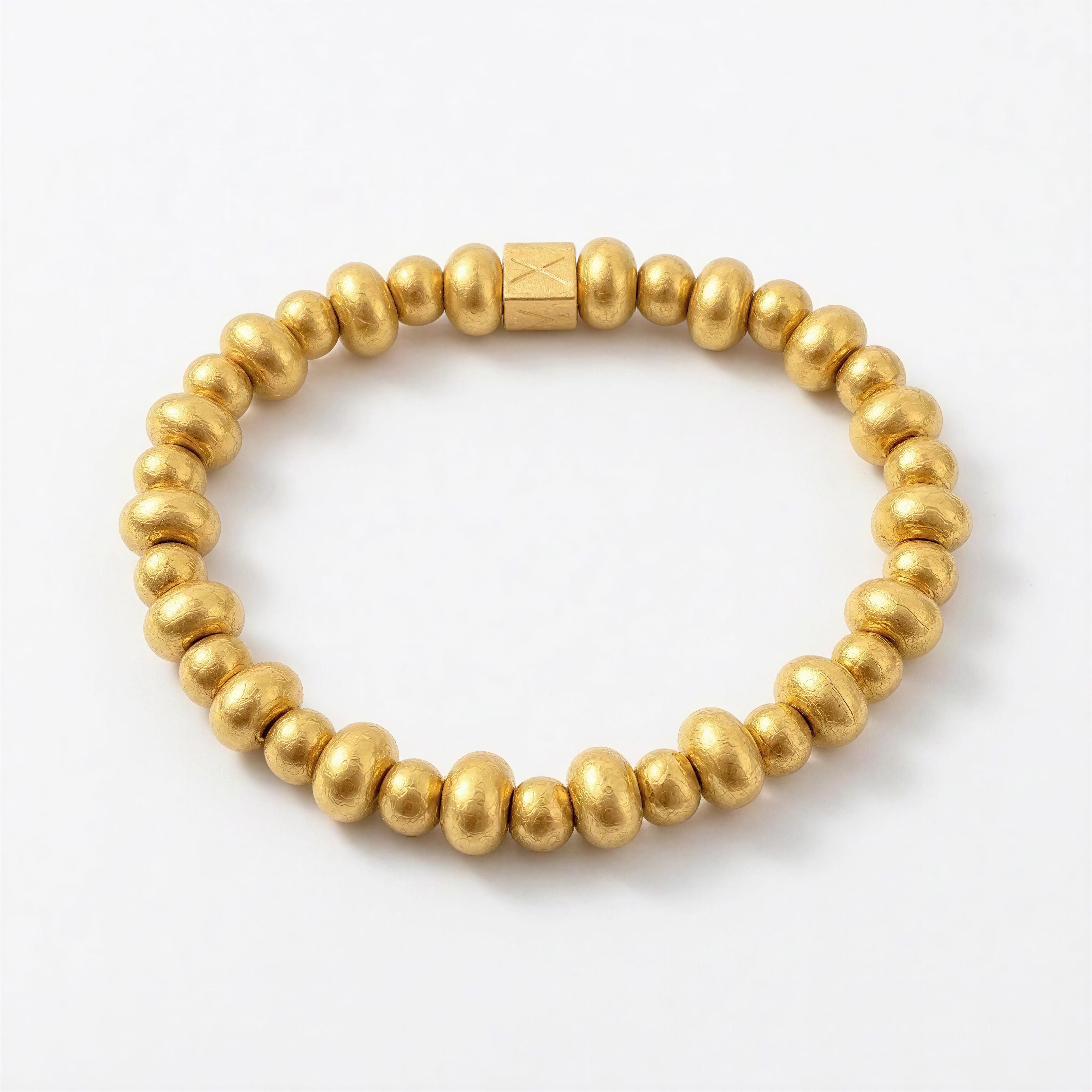 THE ESSENTIAL COLLECTION - Pure Balance gold bead bracelet with smooth, rounded designer beads handcrafted for a balanced, elegant luxury jewelry look.